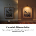 Before and after: taped puck lights fall, the magnetic picture light holds