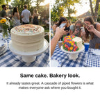 Same cake, bakery look — guests snapping a cake decorated with piped buttercream flowers