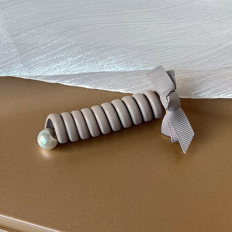 SpiralCharm® - Ligas para el cabello en espiral