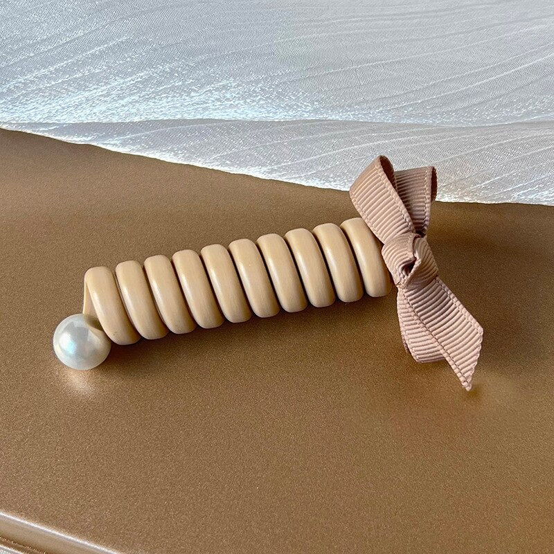 SpiralCharm® - Ligas para el cabello en espiral