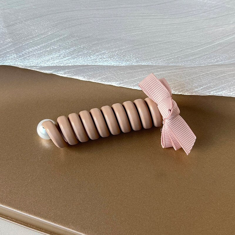 SpiralCharm® - Ligas para el cabello en espiral