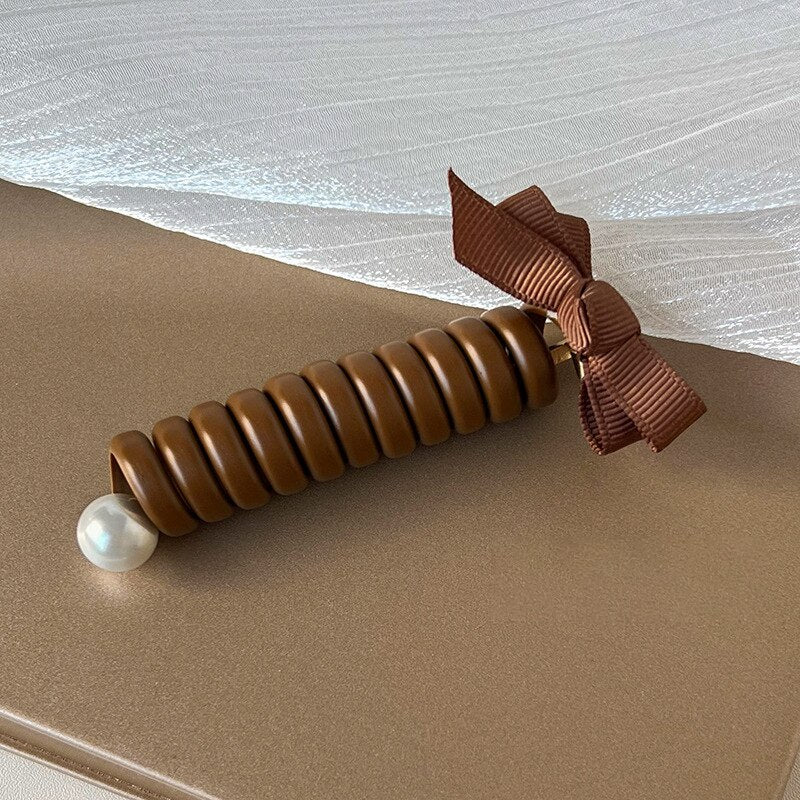 SpiralCharm® - Ligas para el cabello en espiral